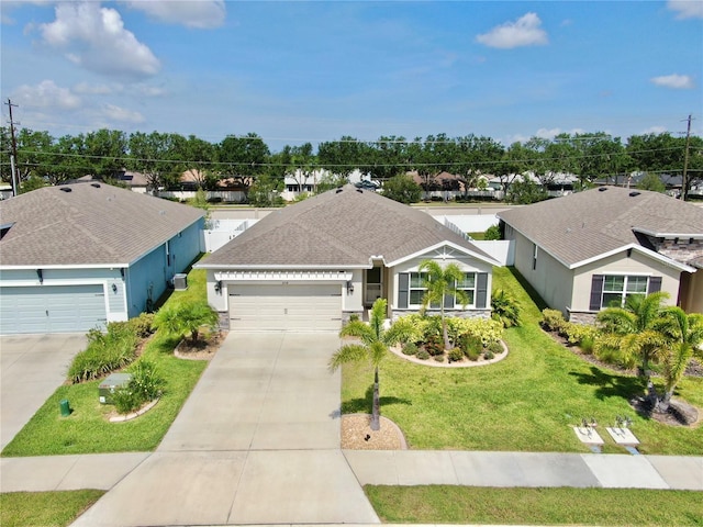 3718 Mossy Limb Ct, Palmetto, FL 34221 - single story home featuring a garage, driveway, a front lawn, stucco siding, and roof with shingles
