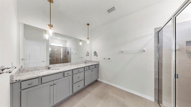 3718 Mossy Limb Ct, Palmetto, FL 34221 - full bathroom featuring a stall shower, double vanity, baseboards, and tile patterned flooring