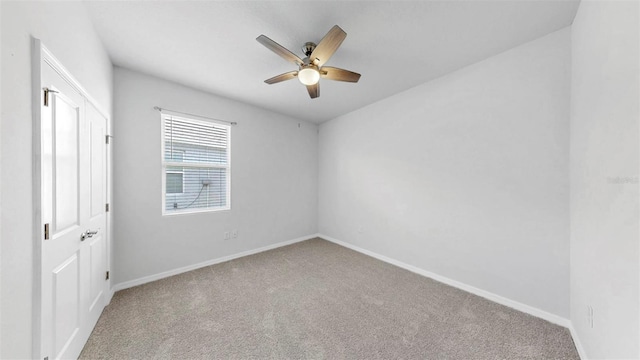 3718 Mossy Limb Ct, Palmetto, FL 34221 - unfurnished bedroom with carpet, baseboards, and a ceiling fan