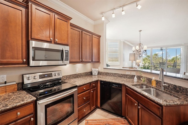 kitchen featuring sink, a notable chandelier, dark stone countertops, appliances with stainless steel finishes, and ornamental molding