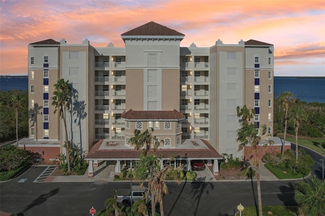 outdoor building at dusk with a water view