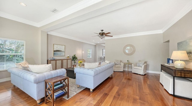 1789 Loma Linda St, Sarasota, FL 34239 - living area featuring a healthy amount of sunlight, baseboards, ceiling fan, and wood finished floors