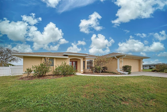 ranch-style house with a garage and a front lawn