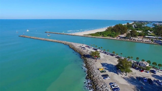 bird's eye view with a beach view and a water view