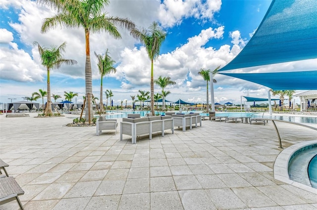 exterior space with a patio and a water view