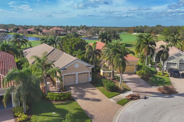 bird's eye view with a water view