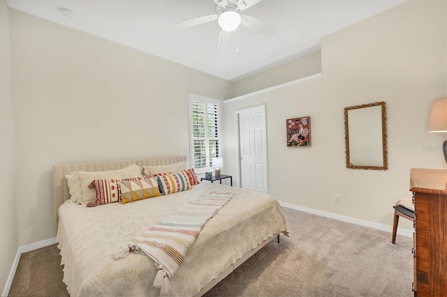 carpeted bedroom with baseboards and ceiling fan