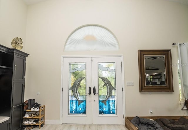 6317 Werner Ave, New Port Richey, FL 34652 - doorway featuring french doors and light wood-type flooring