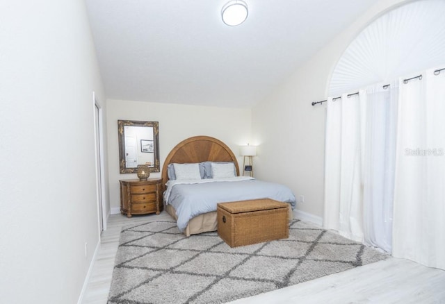 6317 Werner Ave, New Port Richey, FL 34652 - bedroom with wood finished floors and baseboards