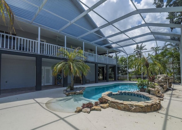 6317 Werner Ave, New Port Richey, FL 34652 - view of swimming pool with a patio, a lanai, and a pool with connected hot tub