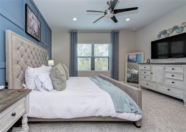 carpeted bedroom with ceiling fan