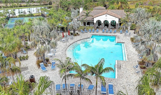 view of swimming pool with a patio area