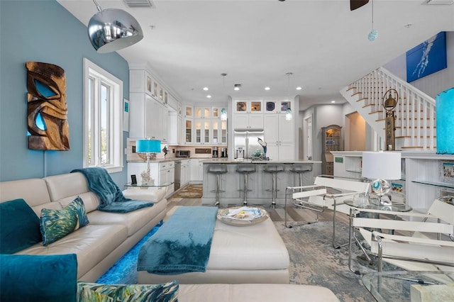 living room with light hardwood / wood-style flooring