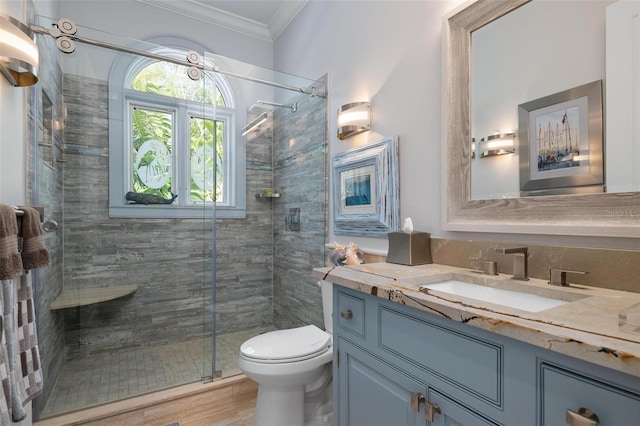 bathroom featuring vanity, hardwood / wood-style flooring, toilet, and walk in shower