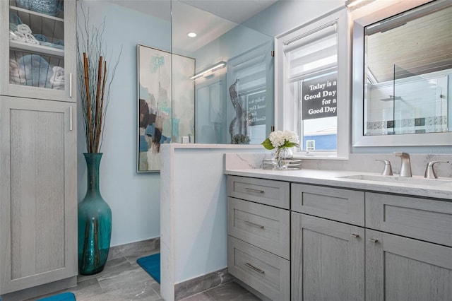 bathroom featuring vanity and walk in shower