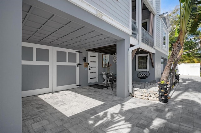 view of patio / terrace featuring a garage