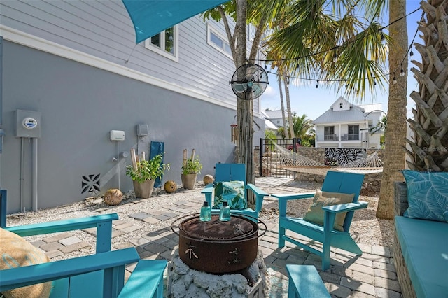 view of patio / terrace with a fire pit