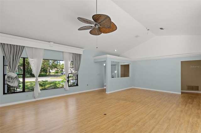 unfurnished living room featuring light hardwood / wood-style flooring, ceiling fan, and lofted ceiling