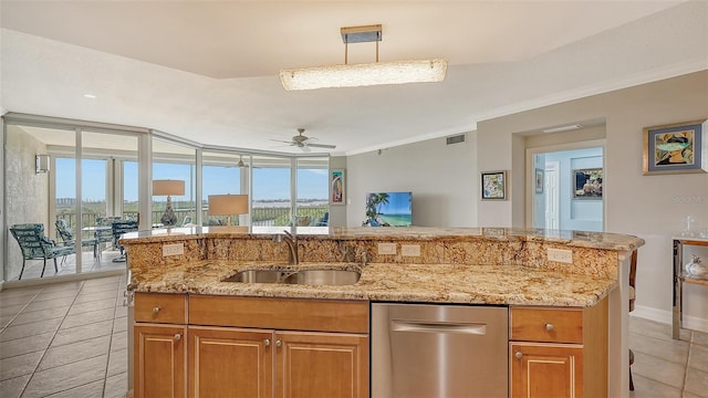 kitchen with sink, ceiling fan, stainless steel dishwasher, hanging light fixtures, and crown molding