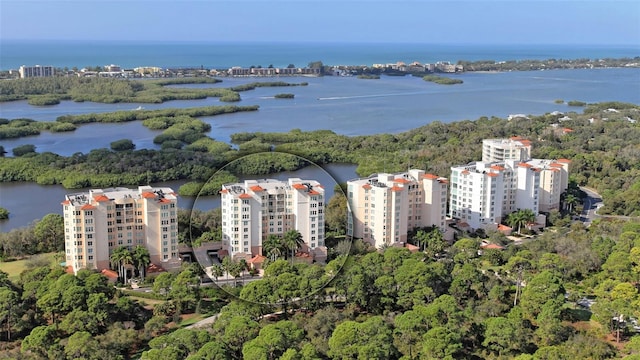 drone / aerial view featuring a water view