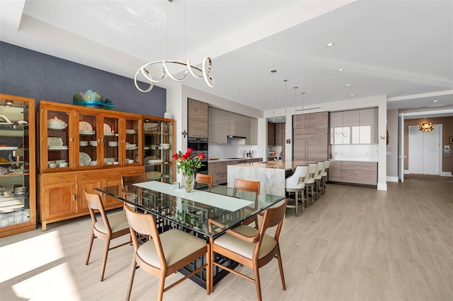 dining area featuring light wood-type flooring