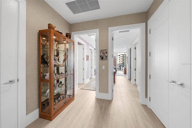 hall featuring light wood-type flooring