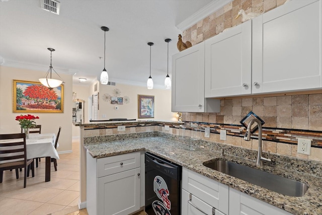 kitchen with ornamental molding, white cabinets, black dishwasher, and tasteful backsplash