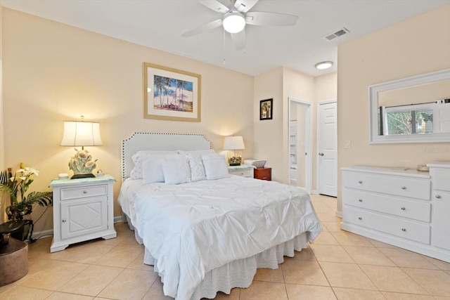 bedroom featuring ceiling fan and light tile patterned floors