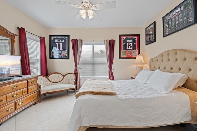 bedroom featuring ceiling fan and light tile patterned floors