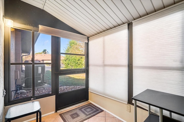 sunroom / solarium with lofted ceiling and wood ceiling