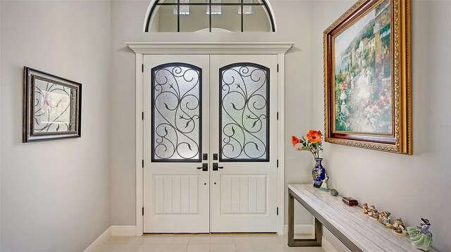 9291 Swaying Branch Rd, Sarasota, FL 34241 - foyer entrance with baseboards and healthy amount of natural light