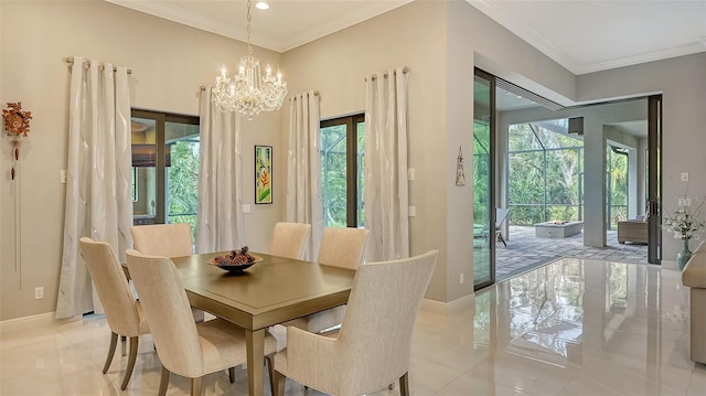 dining room featuring ornamental molding, a wealth of natural light, a notable chandelier, and light tile patterned floors