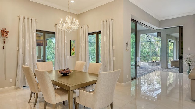 9291 Swaying Branch Rd, Sarasota, FL 34241 - dining room featuring baseboards, healthy amount of natural light, a chandelier, light tile patterned flooring, and crown molding