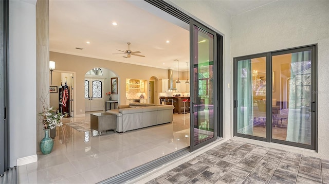 interior space featuring a ceiling fan