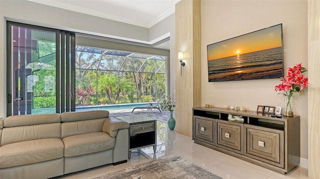 living area with a sunroom, light tile patterned floors, and crown molding