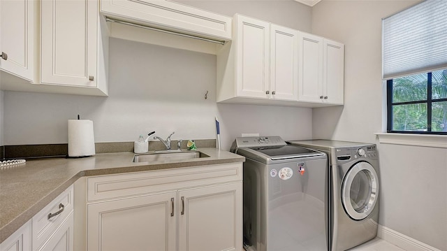 9291 Swaying Branch Rd, Sarasota, FL 34241 - laundry area featuring cabinet space and separate washer and dryer