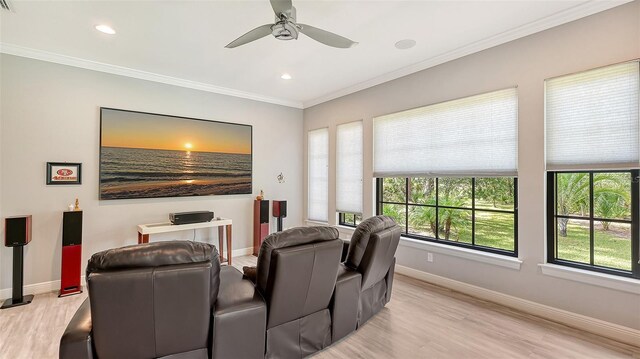 9291 Swaying Branch Rd, Sarasota, FL 34241 - home theater featuring light wood-style floors, baseboards, ornamental molding, a ceiling fan, and recessed lighting