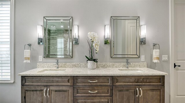 9291 Swaying Branch Rd, Sarasota, FL 34241 - bathroom with double vanity and a shower