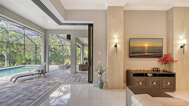 9291 Swaying Branch Rd, Sarasota, FL 34241 - living area with a sunroom, ornamental molding, and baseboards