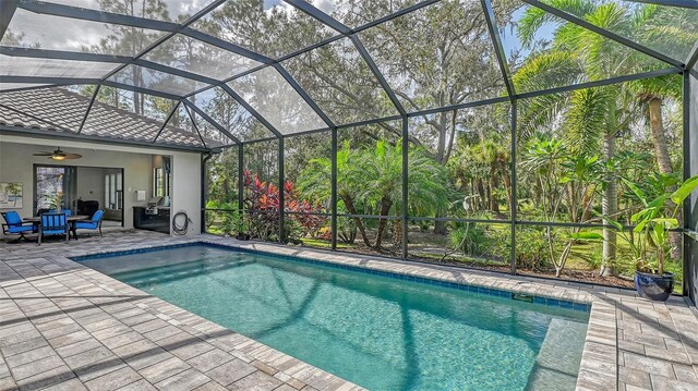 9291 Swaying Branch Rd, Sarasota, FL 34241 - swimming pool with a patio, a lanai, and ceiling fan