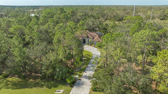 aerial view with a wooded view