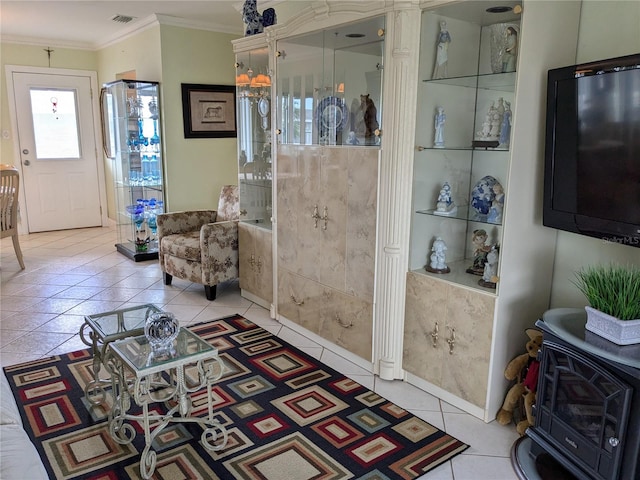 tiled living room with crown molding