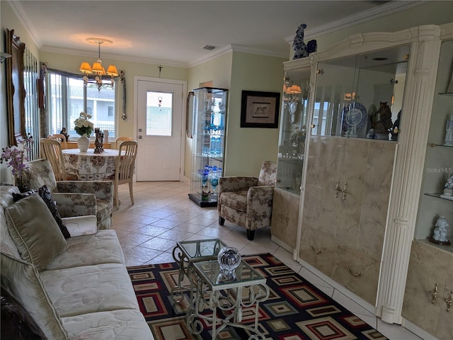 living room featuring a notable chandelier, crown molding, and light tile patterned floors