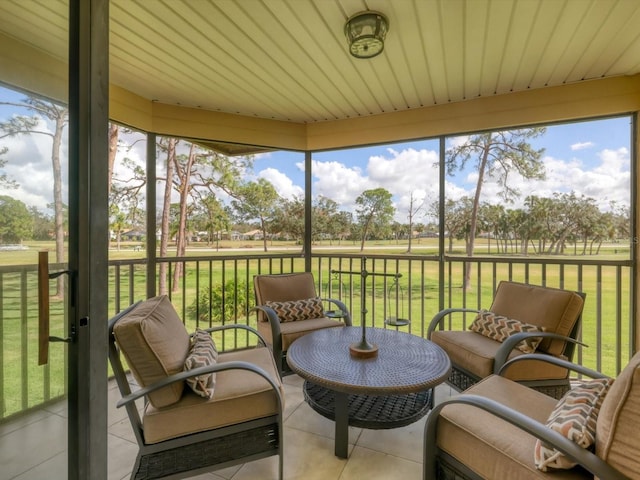 sunroom with wooden ceiling