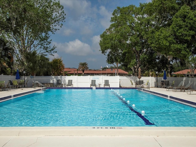 view of pool featuring a patio