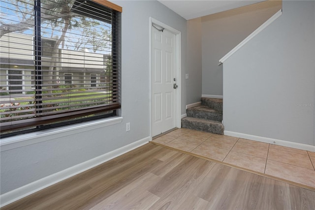 foyer with light hardwood / wood-style floors