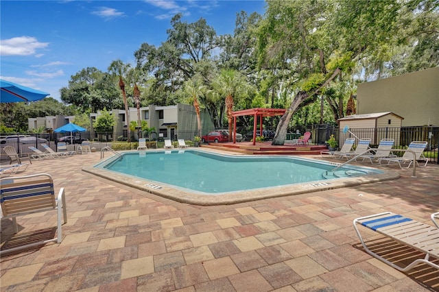 view of pool featuring a patio