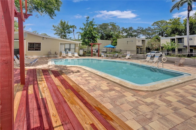 view of pool featuring a patio area