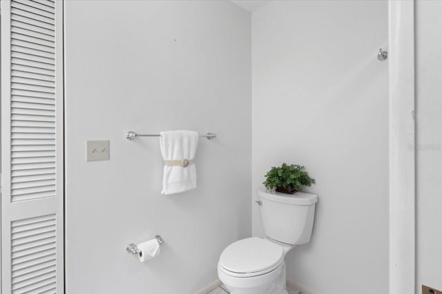 bathroom featuring toilet