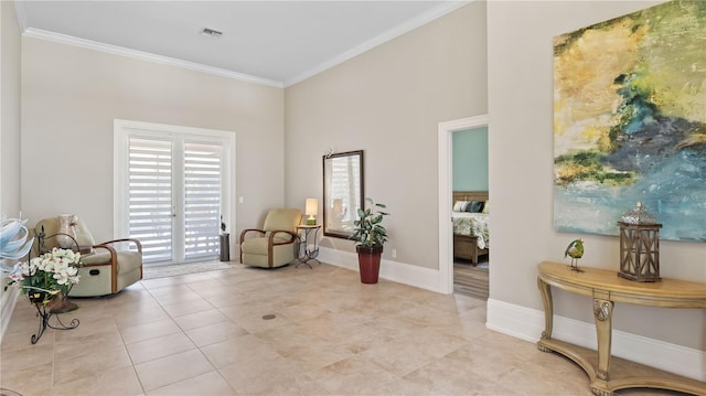 living area with crown molding